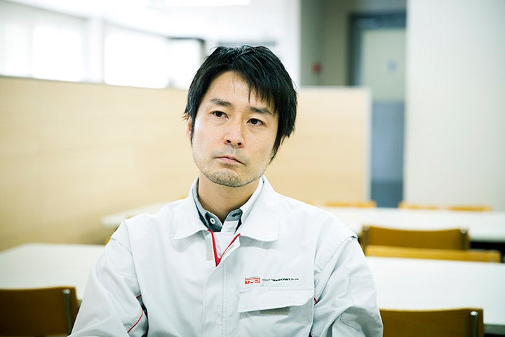 トヨタテクノクラフト株式会社TRD開発部MS車両開発室第１シャシグループ グループ長・清水信太郎さん。トヨタテクノクラフトはパトカーや救急車などの特装車を開発・生産したり、モータースポーツ車両の改造やパーツを作って販売している